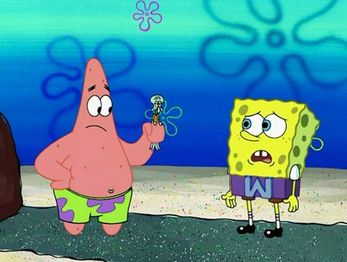 Patrick star holding a small squidward while spongebob is looking disappointed