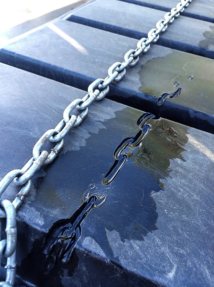 The Heat Melted This Chain Into The Dumpster At My Work