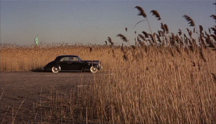 Peter Clemenza opening the car doors