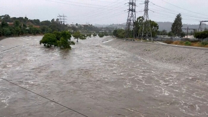 Earthquake And Storm Hit California, People Are Forced To Climb Trees To Escape Floodwaters And Mudslides Earthquake And Storm Hit California, People Are Forced To Climb Trees To Escape Floodwaters And Mudslides