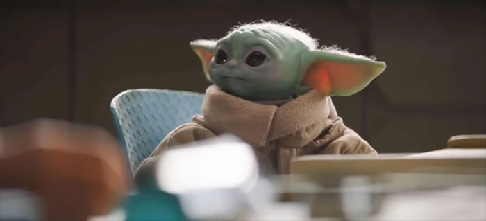 Baby Yoda staring at something