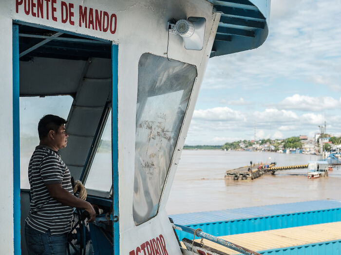 The skipper of Eduardo 7 navigates his way out of La Boca port