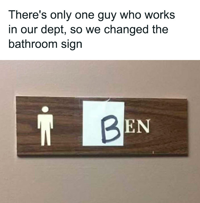 Funny bathroom sign humorously changed to read Ben with taped letter B, a creative example of funny bathroom signs found worldwide.