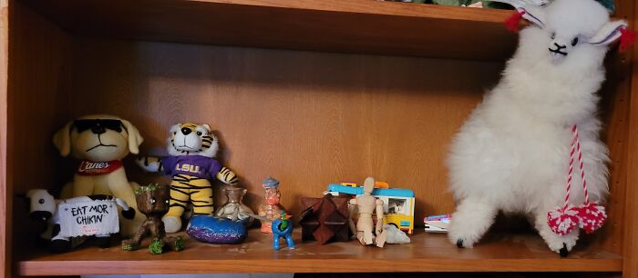 Random Childhood Trinkets. Llama From Peru, Chick-Fil-A Cow, Mike The Tiger, Wooden Groot