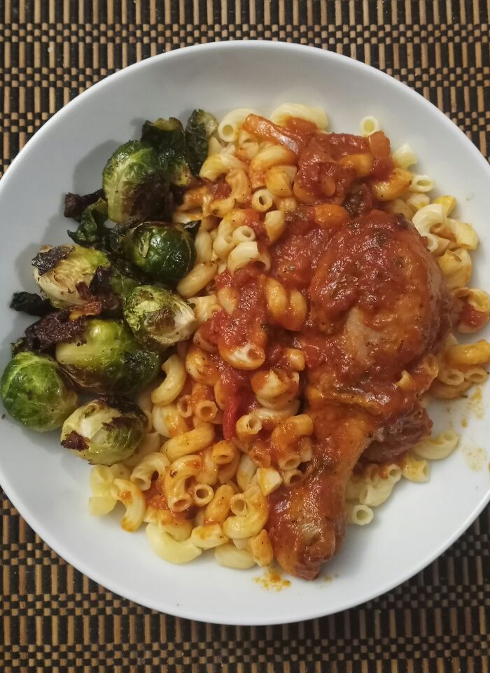 Chicken Braised In Tomato Sauce With Roasted Brussels Sprouts And Pasta