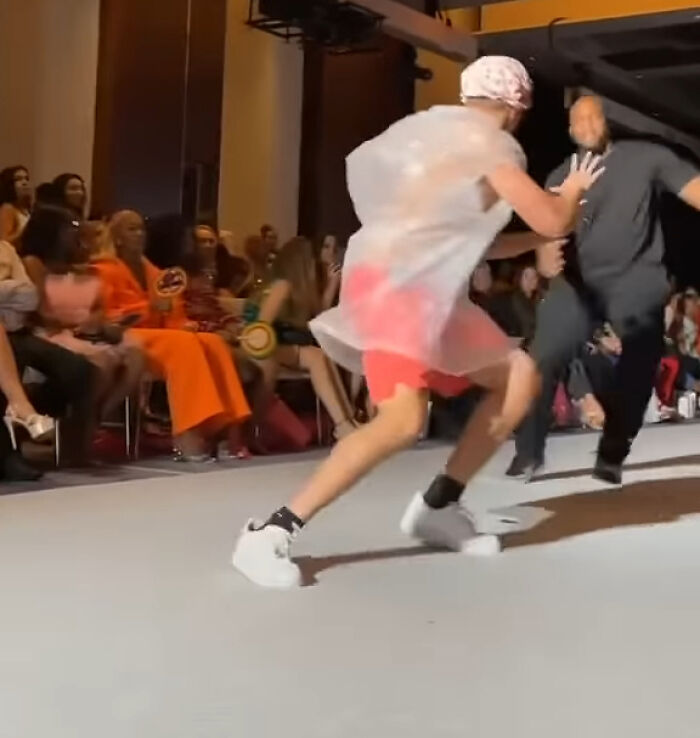 Fashion Week Impostor Goes Viral As He Catwalks Wearing A Trash Bag And No One Notices