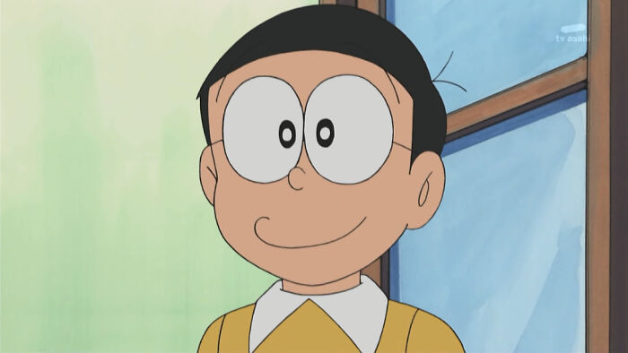 Nobito from Doraemon looking excited