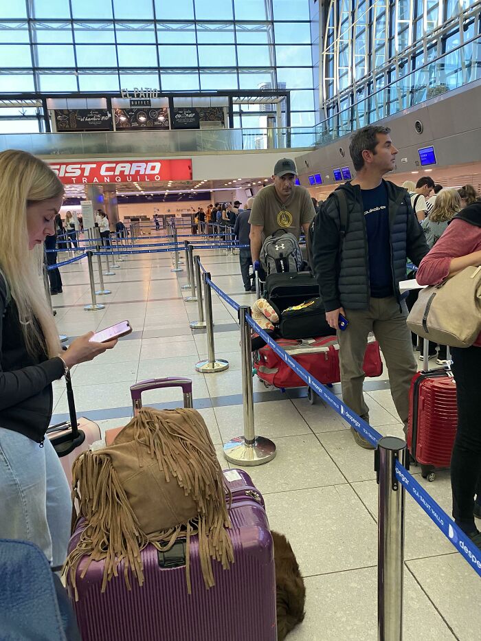 This Girl At The Airport Waits Until The Queue Moves All The Way Forward To Move