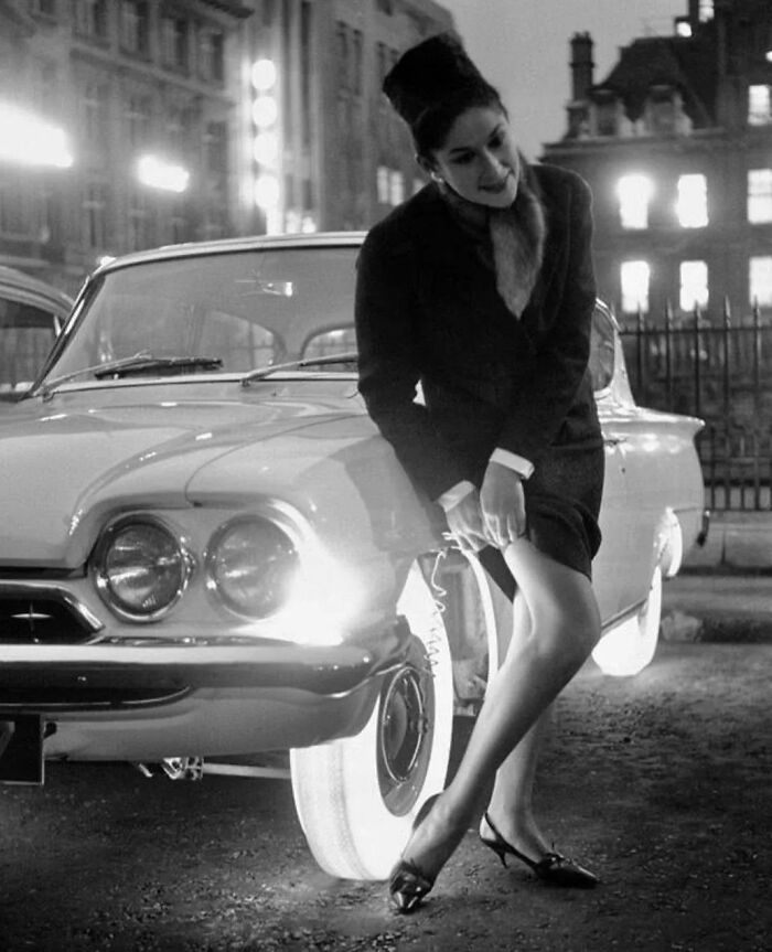 Goodyear’s Illuminated Tires - A Woman Adjusts Her Stocking Using The Light Emitted By The Goodyear Tire On An October Night In 1961