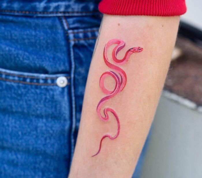 Pink snake tattoo