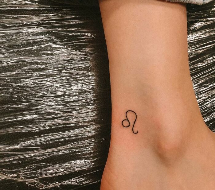 Minimalistic leo zodiac sign ankle tattoo