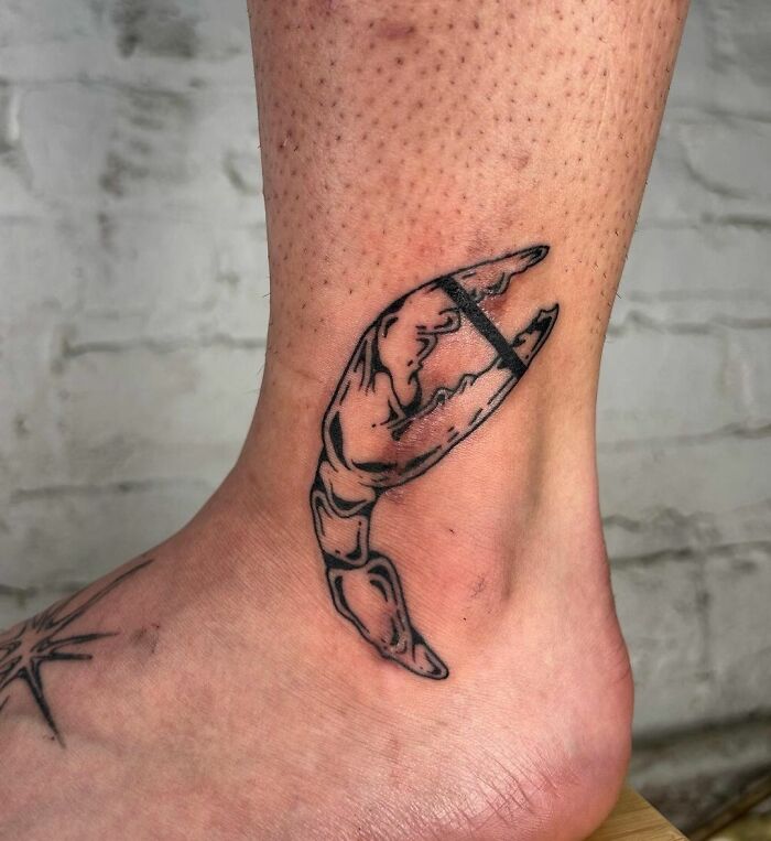 Claw ankle tattoo