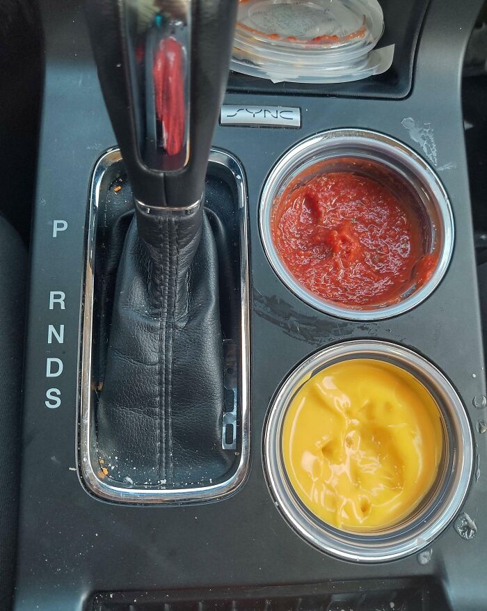 It Should Be Known That American-Made Vehicles Do Not Have "Cup Holders", But Instead Are Designed For Dipping Sauces