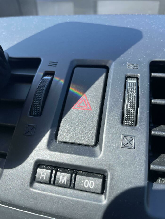 A Reflection From My Friend’s Phone Created A Pink Floyd Album Cover On Her Hazard Button
