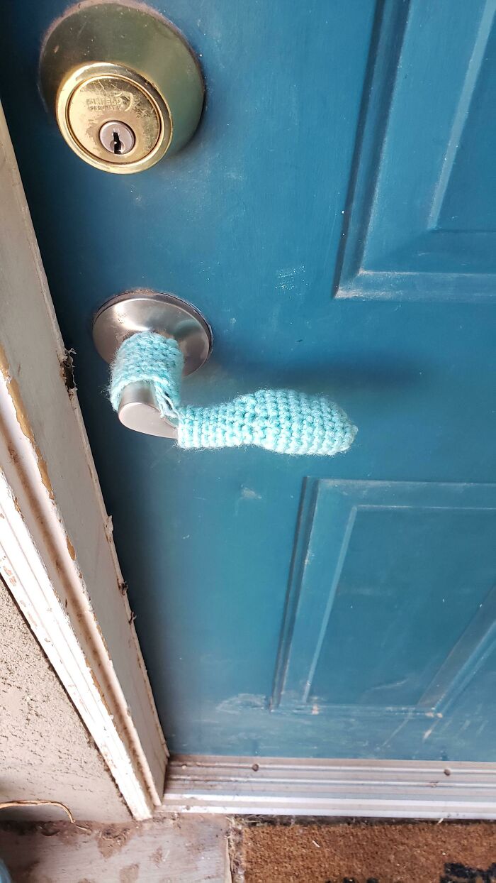 We Live In The Desert, And The Door To Our Apartment Gets A Lot Of Sun. We Keep Burning Ourselves On It By Accident. My Roommate Got Fed Up And Crocheted The Door A Condom