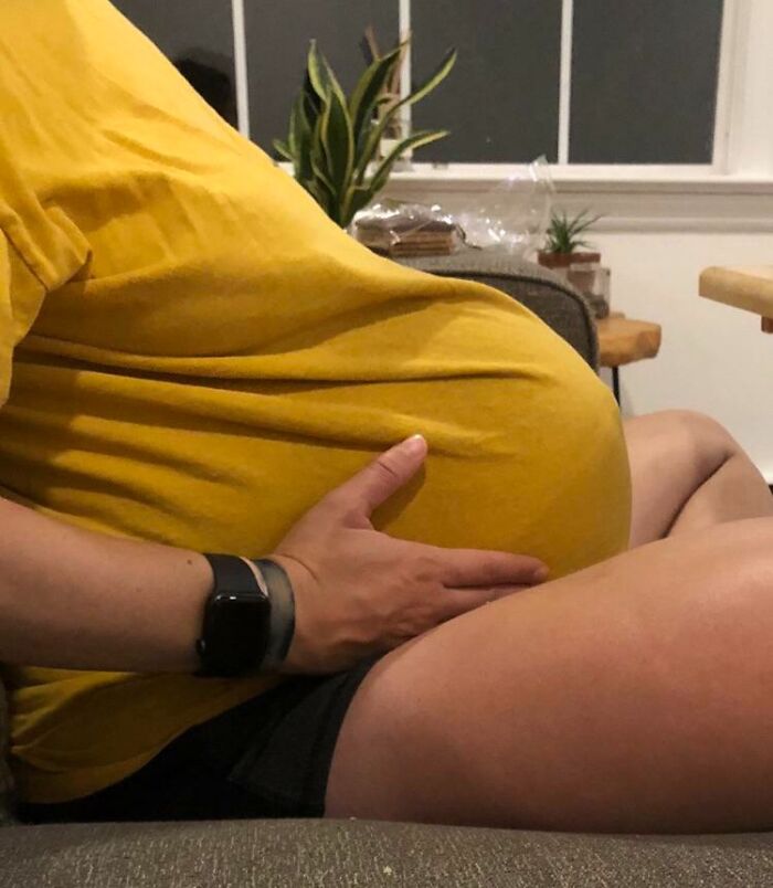 My Wife’s Pregnant Belly Makes It Look Like She’s Smuggling A Pumpkin