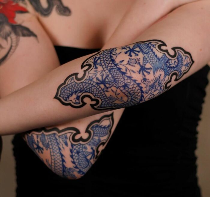 Blue dragon elbow tattoo