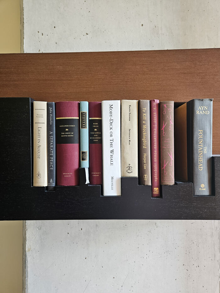 Hotel Bookshelf Levels Out Book Height