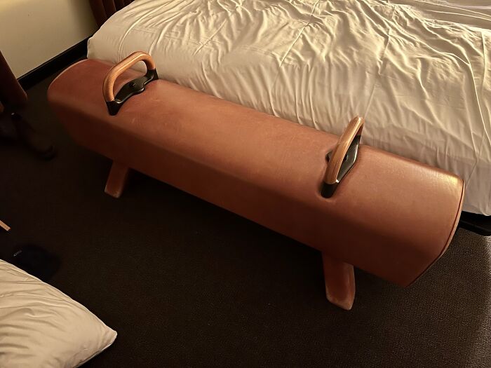 My Hotel Room Has A Pommel Horse At The End Of The Bed