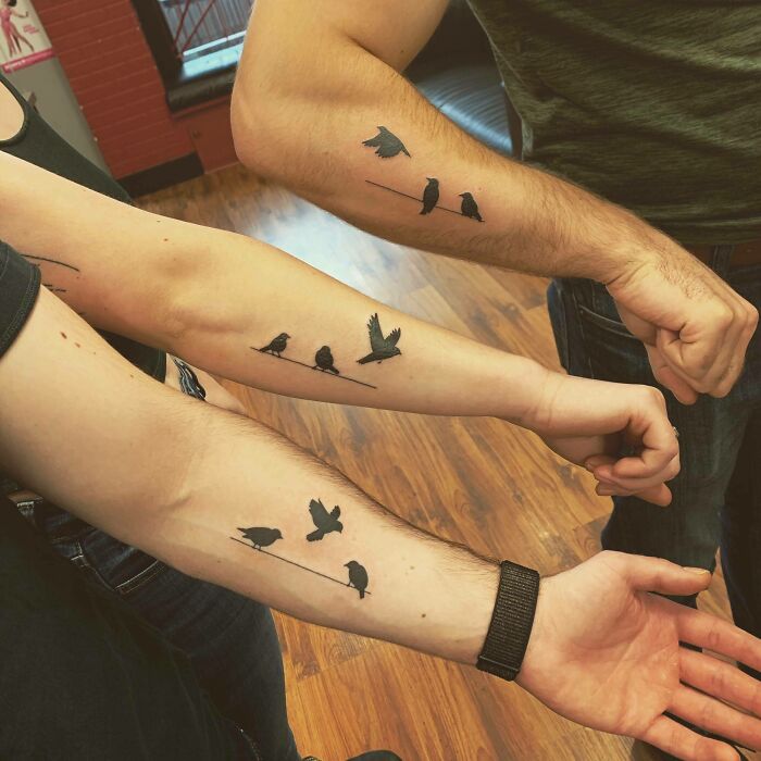 Three flying birds matching forearm tattoos