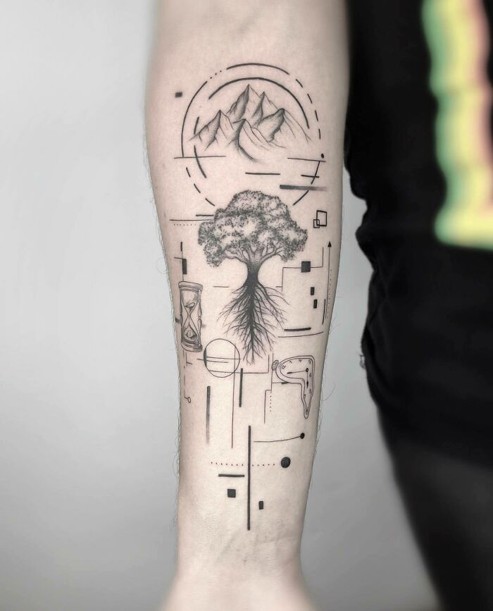 Family tree with mountains arm tattoo