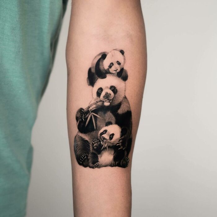 Panda family arm tattoo