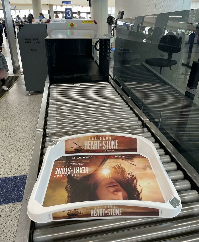Not Even Airport Security Is Safe From Advertising