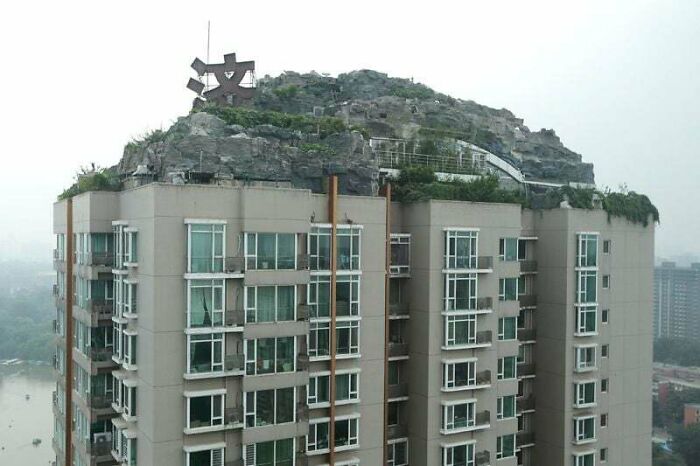 Beijing Man Builds Rock Villa On Top Of Apartment Tower