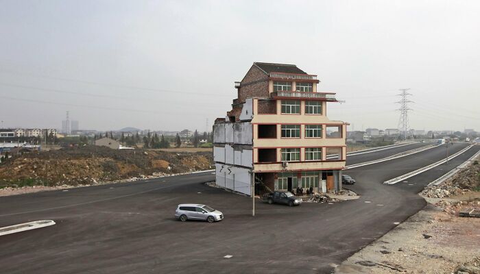 In 2012, The Chinese Government Built A Highway Around A Mans Home After He Refused To Move Out