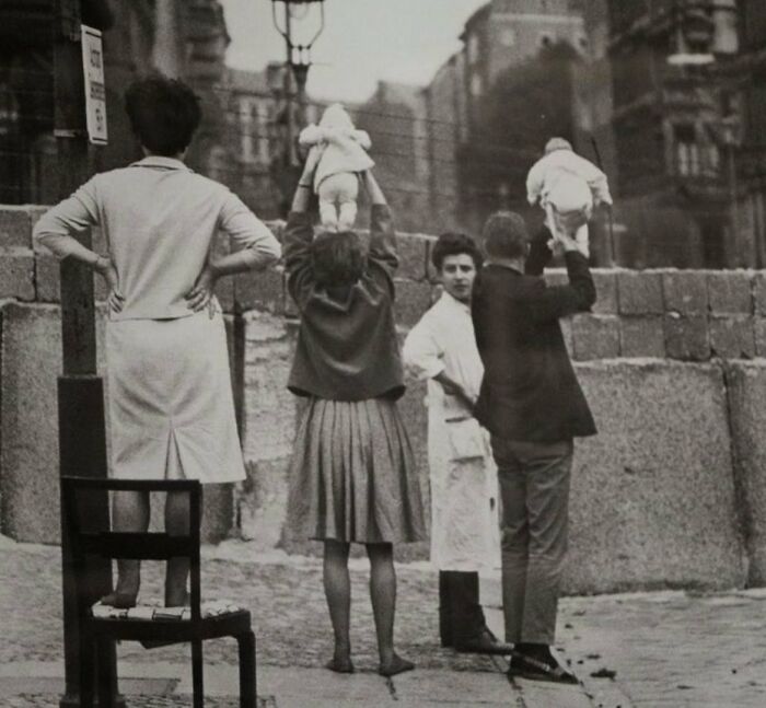 Residents Of West Berlin Showing Their Children To Their Grandparents Who Reside On The Other Side In 1961