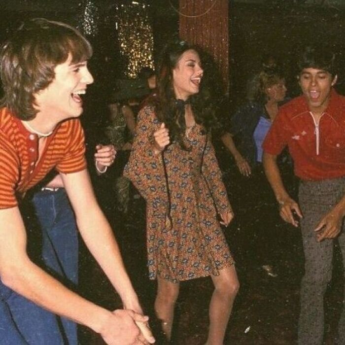 Ashton Kutcher, Mila Kunis And Wilmer Valderrama Having A Dance Off At The That 70s Show Set