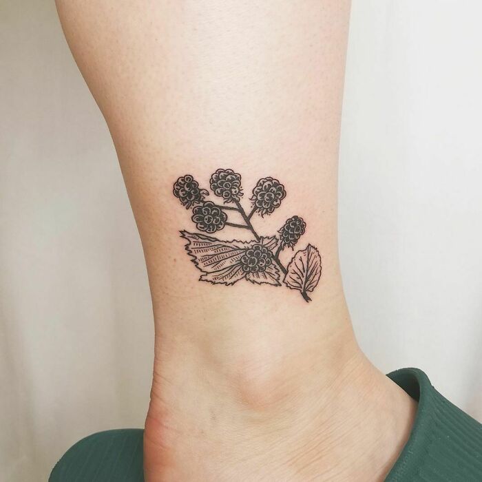 Branch of blackberries ankle tattoo
