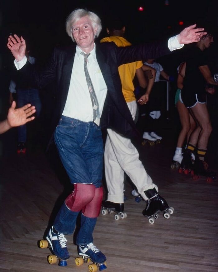 Andy Warhol Roller-Skating At The Roxy In New York City, June 1979. Photo By Robin Platzer