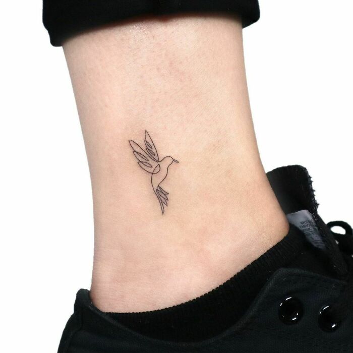 Single line bird ankle tattoo