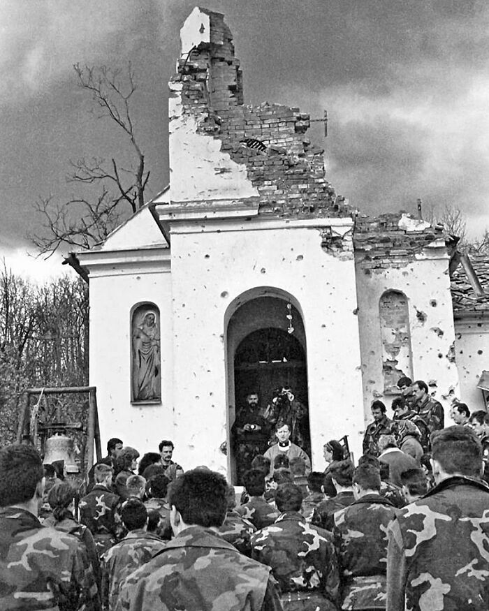 Croatian Soldier Attending A Mass In Front Of A Destroyed Church, Croatian Homeland War, 1991-1995