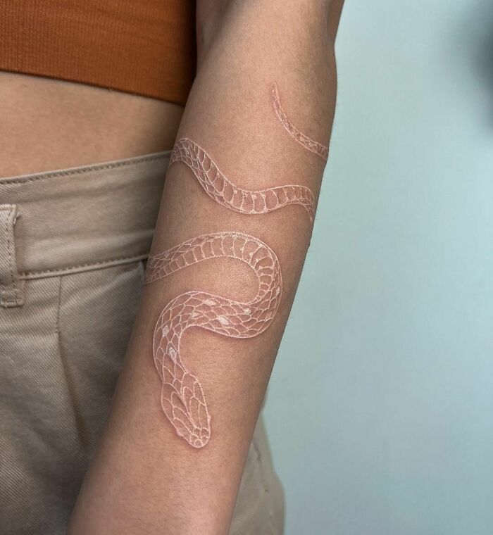 White snake forearm tattoo