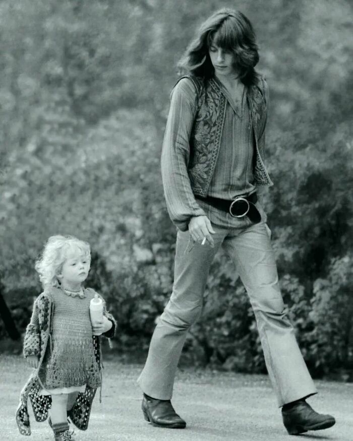 Hippie Dad Walking With His Daughter, Amsterdam, 1967. Photo By Toni Riera