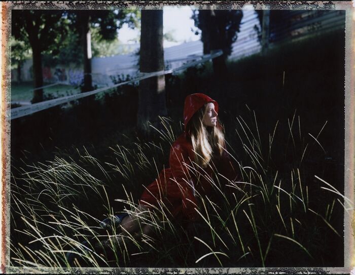 A picture of a woman in the grass