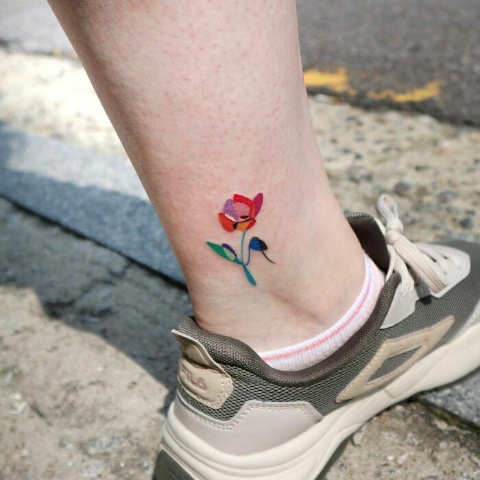 Watercolor flower ankle tattoo