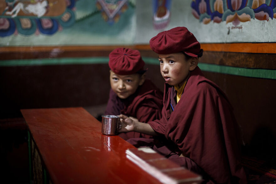 Two little monks during the morning prayers