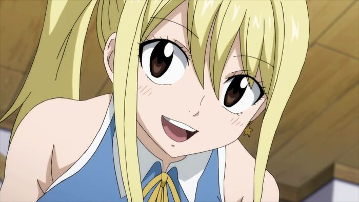Lucy Heartfilia from Fairy Tail looking happy