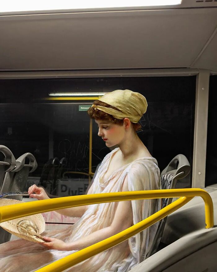 An image of a woman from "On The Terrace" painting in a bus