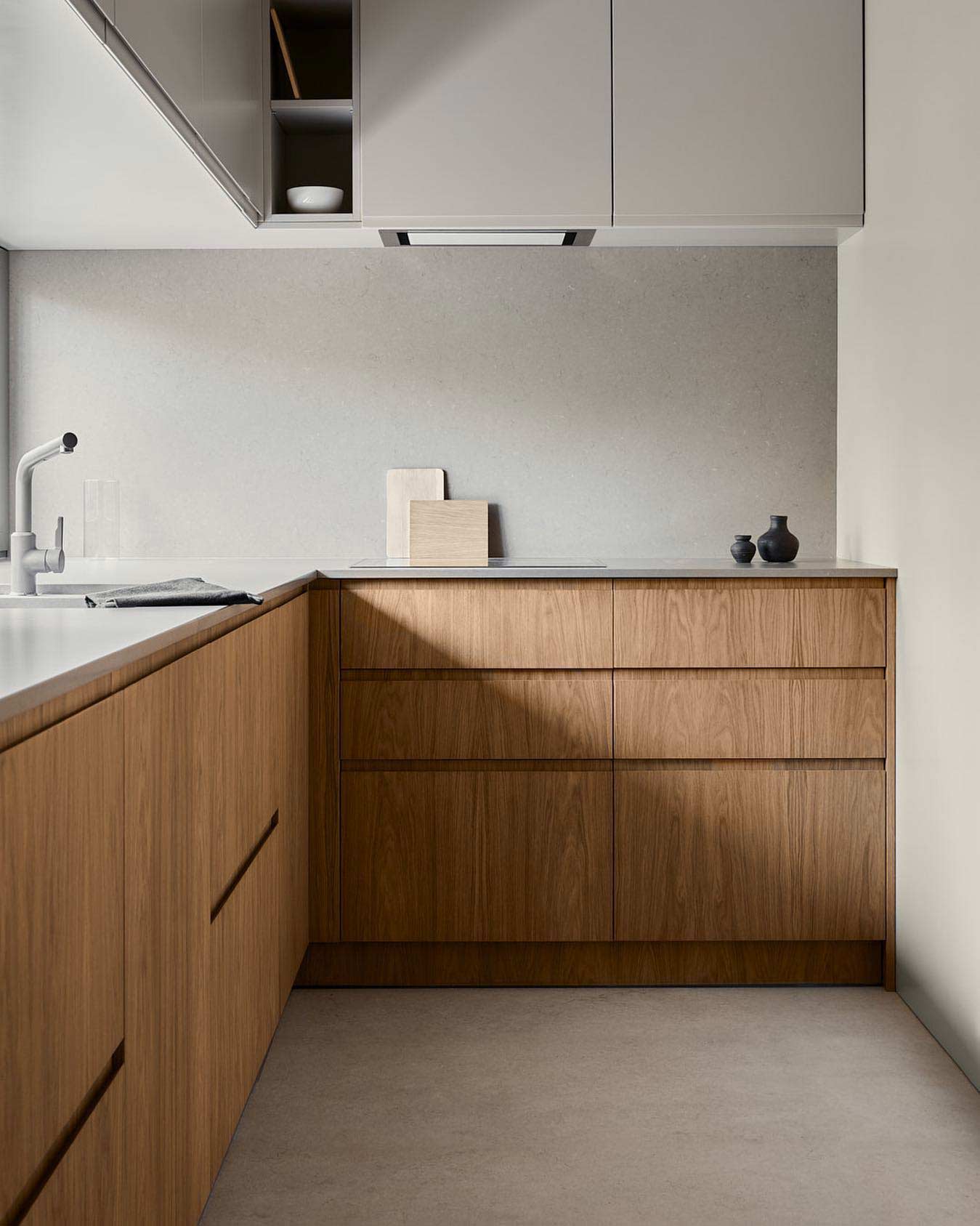 Metod system kitchen with gray and wooden cabinets in natural and discreet colors