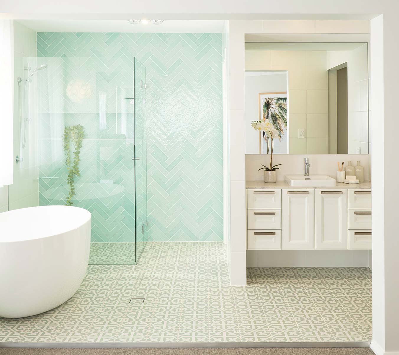 Walk in shower with green mint tiles
