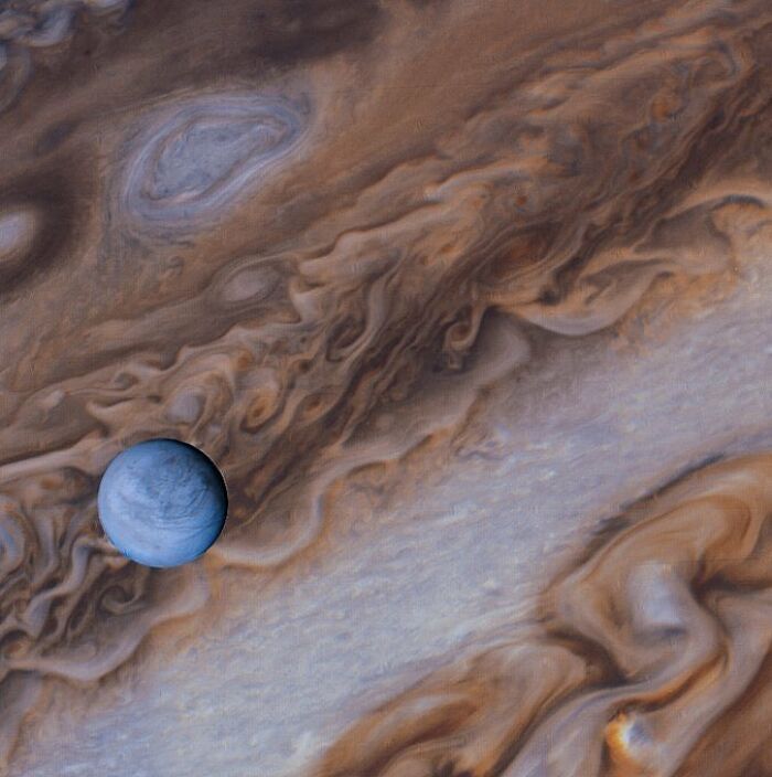 Voyager Captures Jupiter And Europa- One Of Its 79 Moons