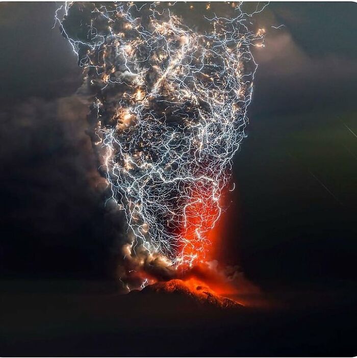 The Spectacular Phenomenon Of A Lightning Tornado. Yes, It Is Above An Erupting Volcano