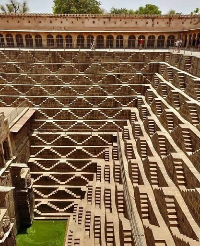 How Was It Possible To Construct Such A Marvel Without Knowledge Of Geometry, Mathematics, Physics, Engineering, And Other Sciences? Yet, Our Ancestors Had Access To All Of These And More. The Chand Baori, A Hidden Treasure Of Bharat, Was Constructed Over 1000 Years Ago In The Abhaneri Village Of Rajasthan, India. This Extraordinary Well Is An Architectural Wonder, With A Depth Of 64 Feet, 13 Floors, And 3,500 Narrow Steps Arranged In Impeccable Symmetry. It Is One Of The World's Largest And Most Stunning Stepwells, Showcasing The Remarkable Abilities Of Our Ancestors