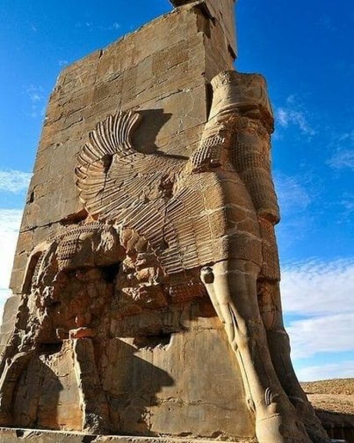 Nestled Within The Ancient Ruins Of Persepolis, Shiraz, Iran, Stands The Iconic Welcoming Gate Of All Nations, Also Recognized As The Gate Of Xerxes. This Architectural Marvel Serves As A Vivid Connection To The Past And The Grandeur Of Persian History. The Roots Of Persepolis Trace Back To The Visionary Efforts Of Darius The Great, A Notable Figure Reigning From 522 To 486 Bc. After Successfully Reinstating 23 States Across The Middle East, Darius Undertook The Ambitious Task Of Erecting Persepolis. This City, A Testament To His Leadership And The Resilience Of The Empire, Would Eventually Become A Beacon Of Cultural Exchange And Diplomacy. Xerxes, The Son Of Darius, Further Enriched Persepolis' Splendor By Overseeing Its Completion In 465 Bc. The Welcoming Gate Of All Nations, Aptly Named, Embodies The Essence Of Unity Amidst Diversity. Its Intricate Carvings And Distinctive Symbols Represent The Various Nations Under Persian Influence, Underscoring The Empire's Commitment To Peaceful Coexistence. As We Admire The Gate Of All Nations, We're Transported Back To An Era When Architecture Was A Testament To Diplomacy And The Rich Heritage Of Persia. It Stands Not Only As A Physical Structure But As A Bridge To The Stories Of Those Who Once Passed Through Its Gates, A Tribute To The Vision Of Leaders Who Shaped History