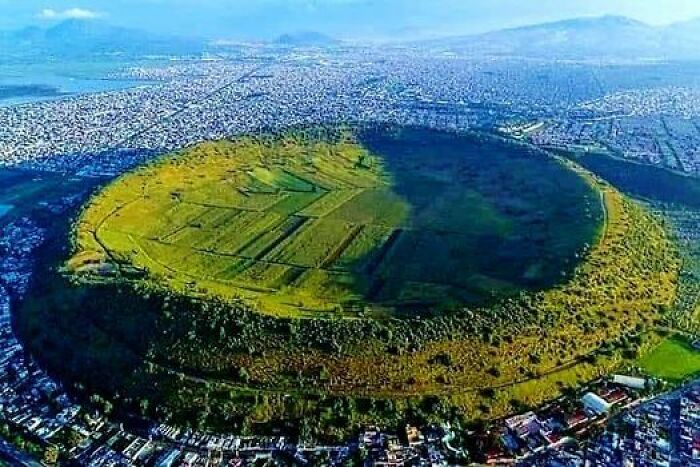 The Xico Volcanic Crater, Also Referred To As Cerro De Xico Or The "Hill Of Xico," Boasts A One-Kilometer-Wide Expanse That Offers A Unique Sanctuary Of Fertile Soil And Naturally Shielded Farmland Amidst The Continuous Expansion Of Mexico City. Centuries Ago, This Area, Including The Xico Crater And Its Surroundings, Was Submerged Beneath The Waters Of Lake Chalco. However, During The 16th Or 17th Century, The Lake Underwent Drainage Efforts To Create Agricultural And Developmental Opportunities For The Region. Today, The Xico Volcanic Crater Stands As A Testament To The Transformative Nature Of Human Ingenuity And Serves As A Haven Of Productivity And Natural Beauty Amid The Urban Landscape