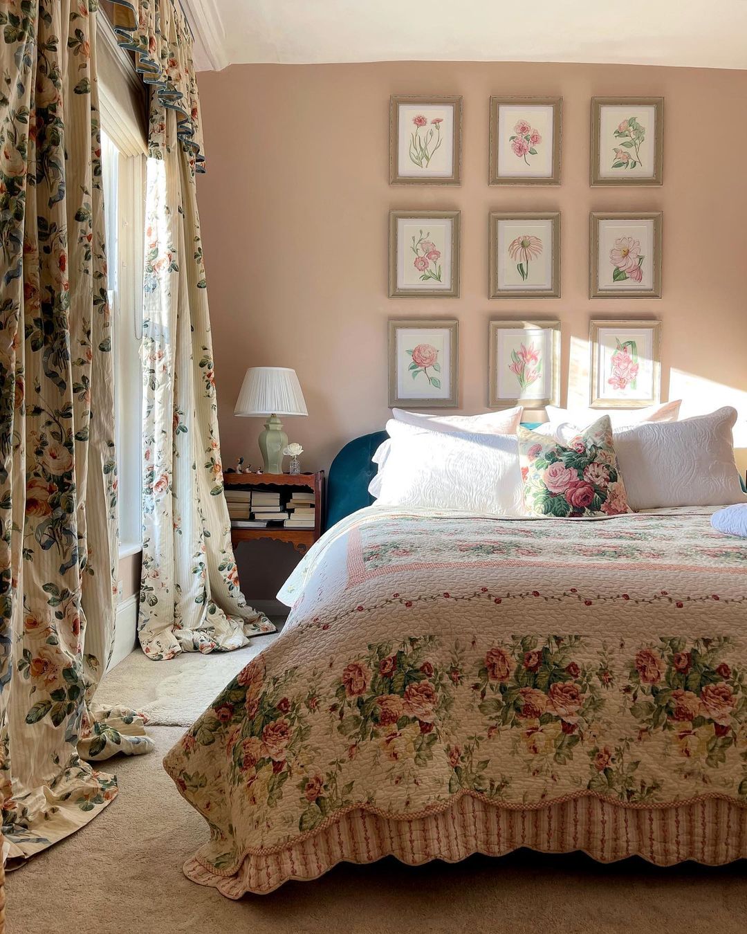 bed with floral bedding in the background of flower picture wall bed with floral bedding in the background of flower picture wall